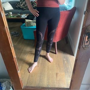 Lululemon black laser-cut detail leggings